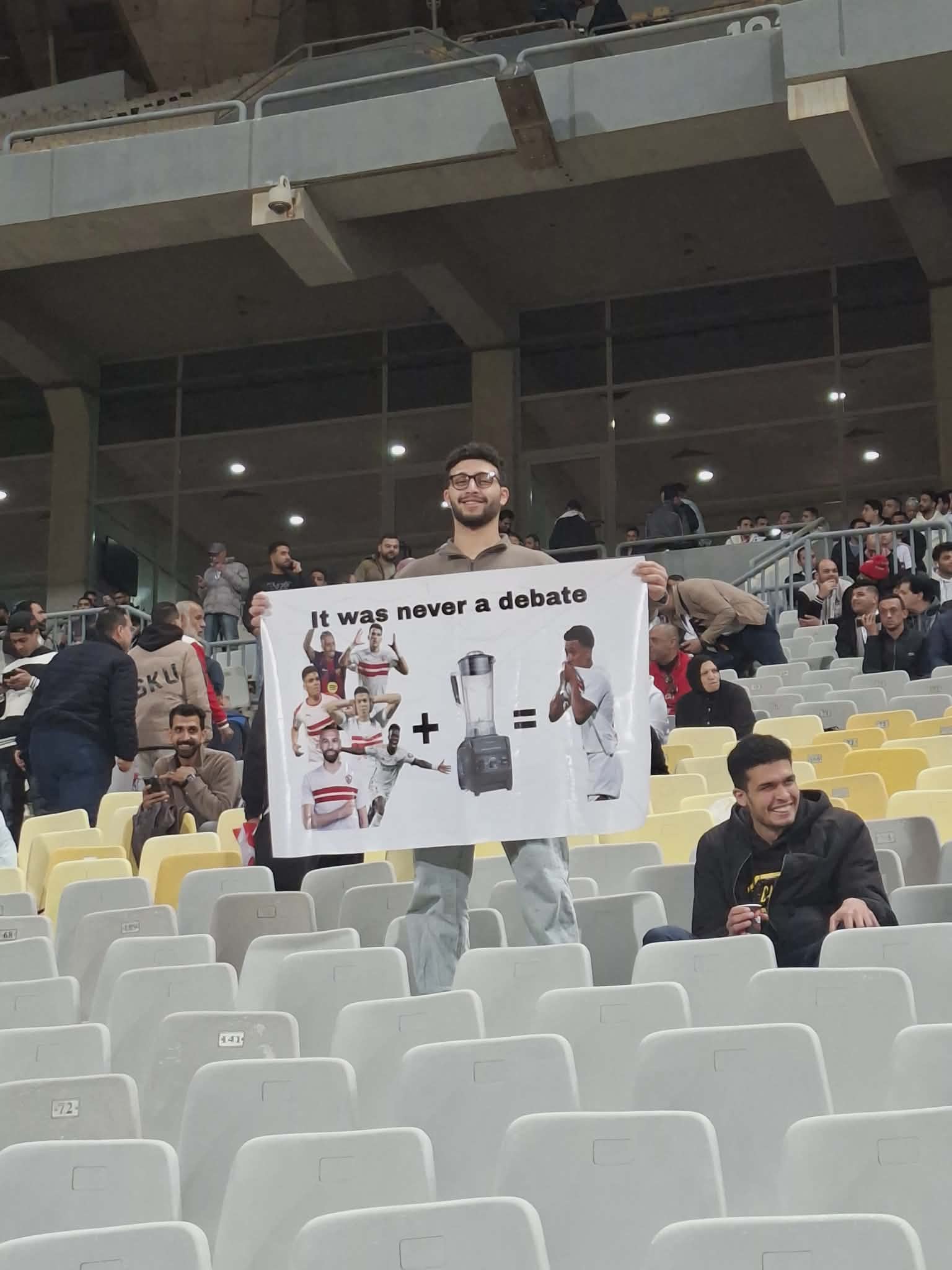 لافتة طريفة بمدرجات برج العرب تثير التفاعل قبل لقاء الزمالك والمصري- صورة 2 لافتة طريفة بمدرجات برج العرب تثير التفاعل قبل لقاء الزمالك والمصري- صورة